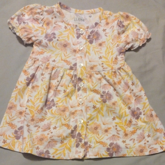 laughing llama Other - Charming Floral Baby Dress with Buttons